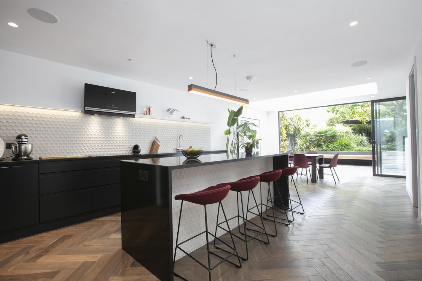 Large open planned kitchen in a neat modern house - Wooster & Stock blog explains why presentation matters when selling your home. 